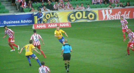 Gerald Sibon (9) about to release Wayne Shroj for Melbourne Heart